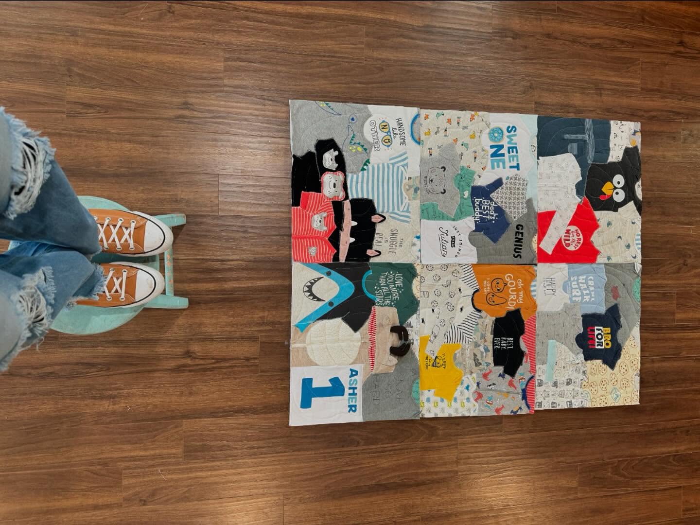 The finished memory quilt made from those baby clothes.